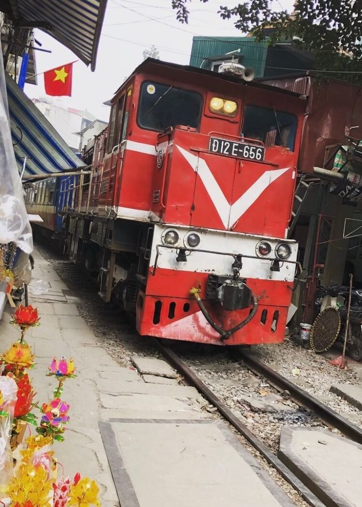 red train on train street