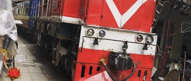 red train on train street